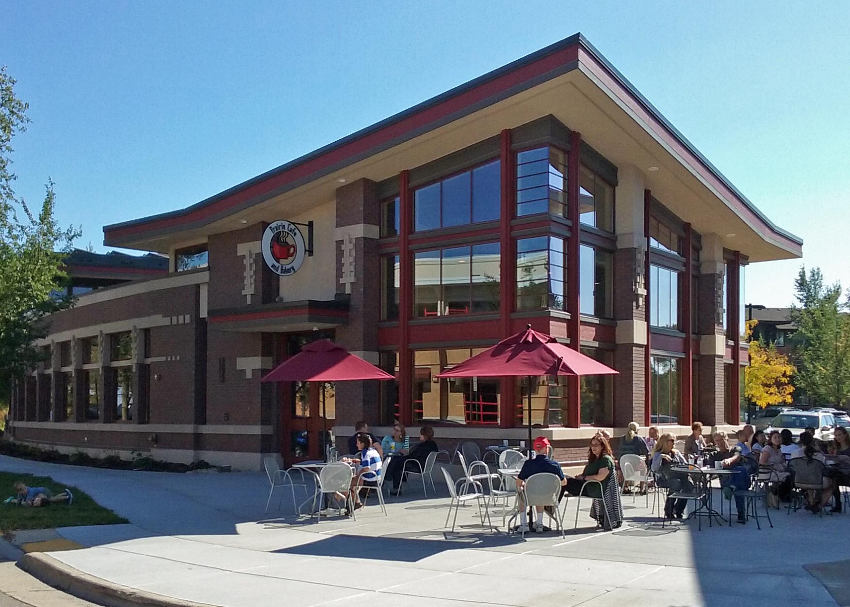 Prairie Cafe and Bakery on Pheasant Branch Road in Middleton, with red umbrellas over the patio tables
